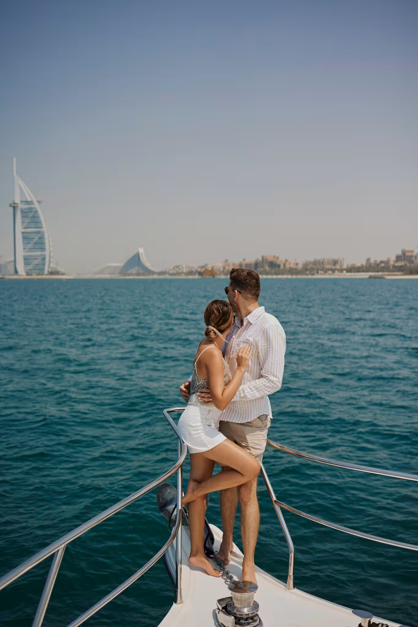 Dubai couple photographer shooting on yacht and dubai desert